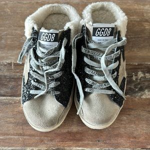 Women’s fur Golden Goose slip ons size 36.